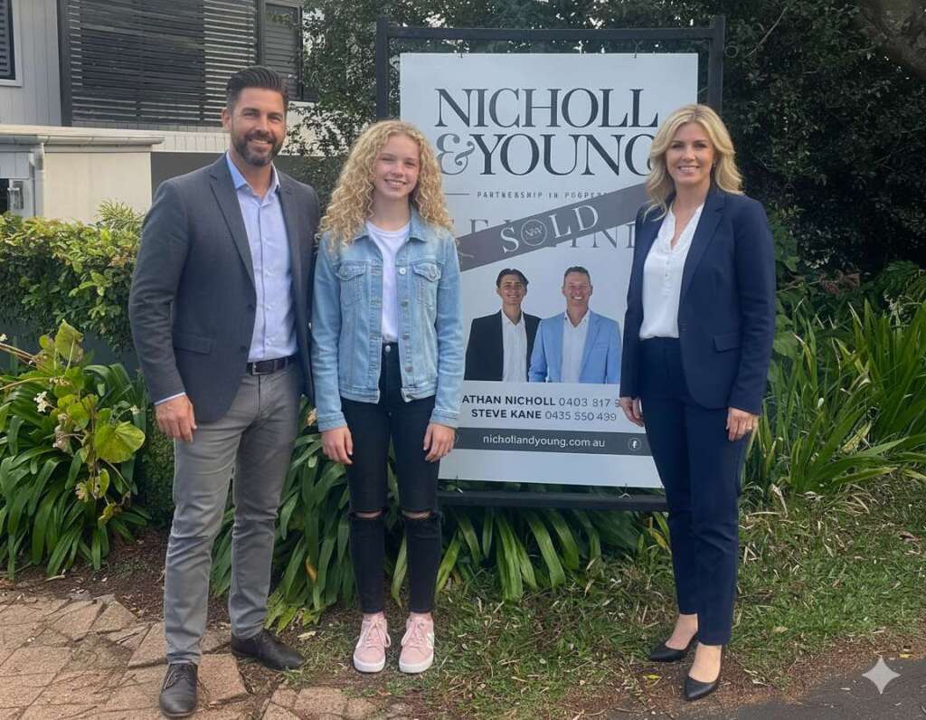 Property investment family celebrating sale